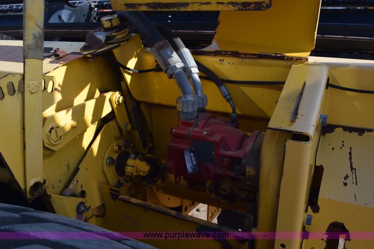 image for item K2432 2003 New Holland HW320 self-propelled windrower