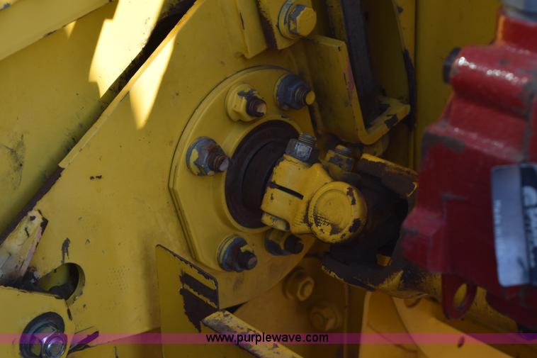 image for item K2432 2003 New Holland HW320 self-propelled windrower