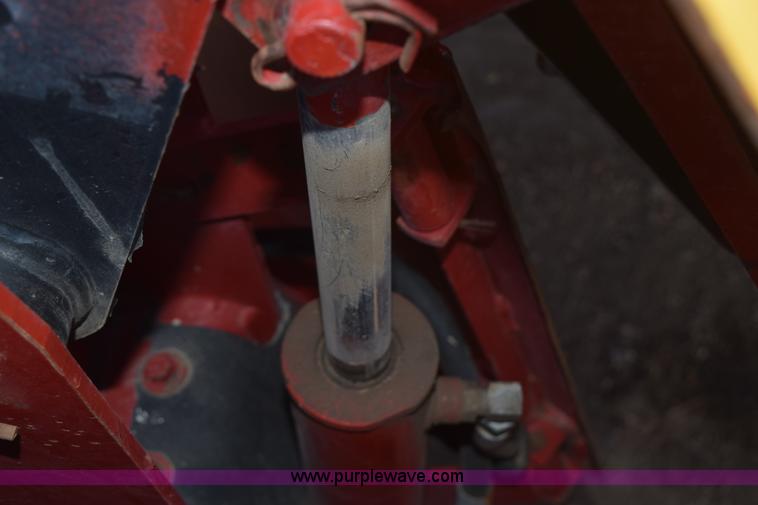 image for item K2432 2003 New Holland HW320 self-propelled windrower