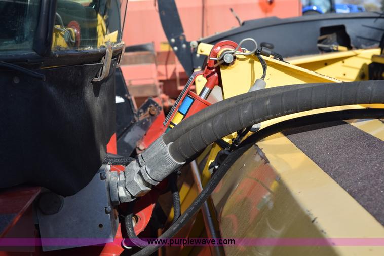 image for item K2432 2003 New Holland HW320 self-propelled windrower