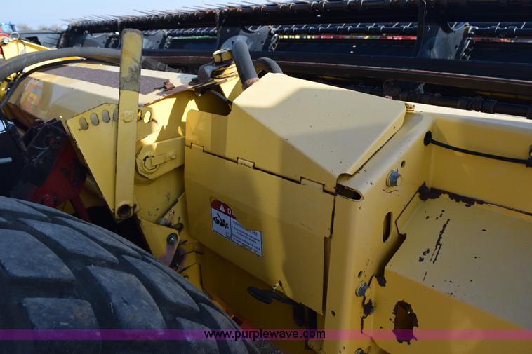 image for item K2432 2003 New Holland HW320 self-propelled windrower