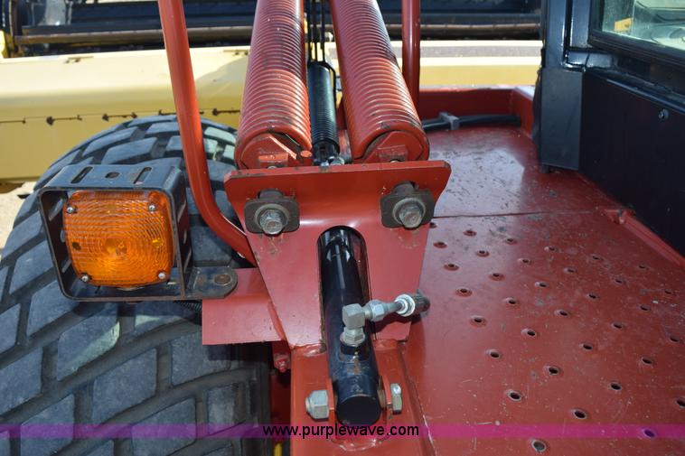 image for item K2432 2003 New Holland HW320 self-propelled windrower