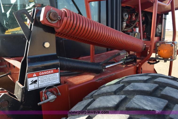 image for item K2432 2003 New Holland HW320 self-propelled windrower