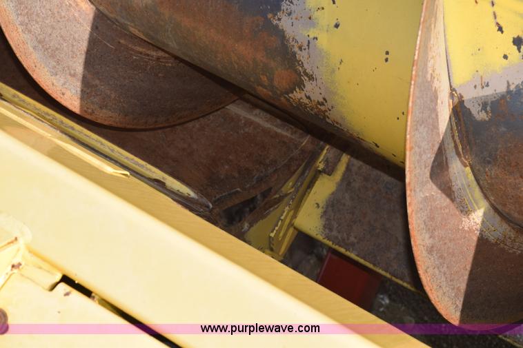 image for item K2432 2003 New Holland HW320 self-propelled windrower