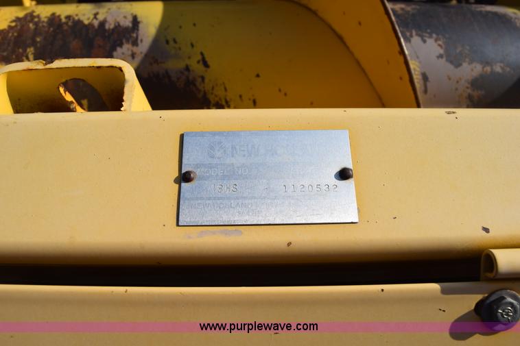 image for item K2432 2003 New Holland HW320 self-propelled windrower