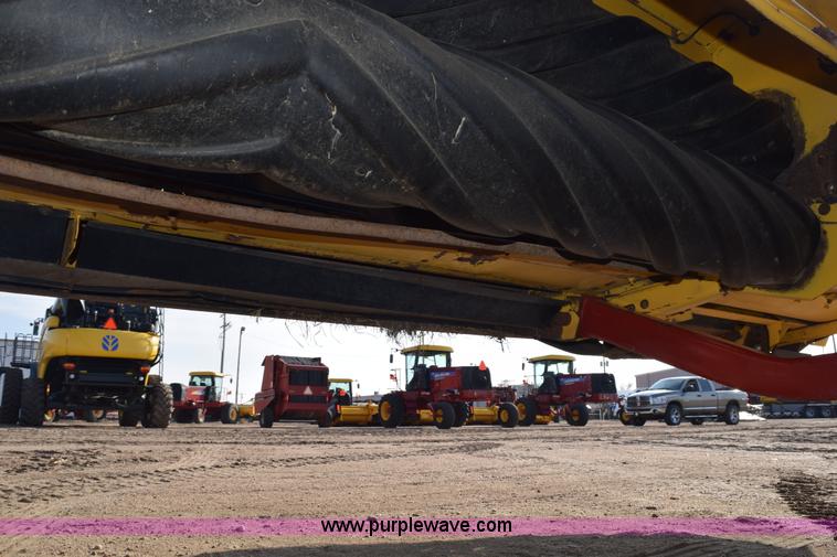 image for item K2432 2003 New Holland HW320 self-propelled windrower