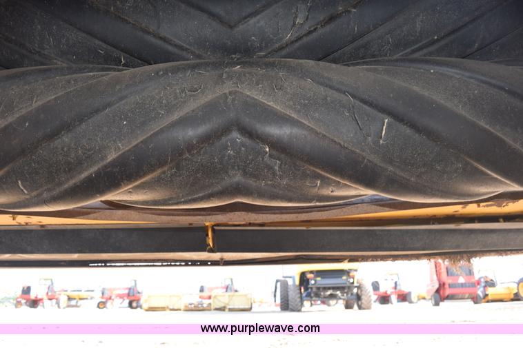 image for item K2432 2003 New Holland HW320 self-propelled windrower