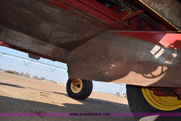 image for item K2432 2003 New Holland HW320 self-propelled windrower