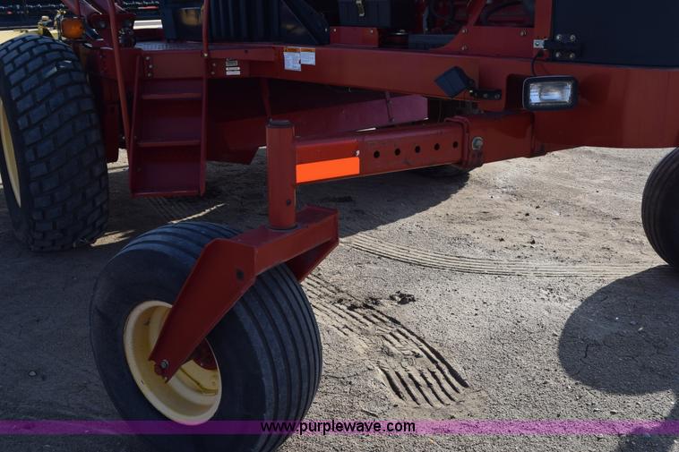 image for item K2432 2003 New Holland HW320 self-propelled windrower