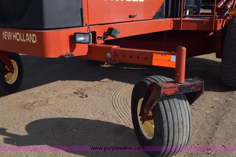 image for item K2432 2003 New Holland HW320 self-propelled windrower