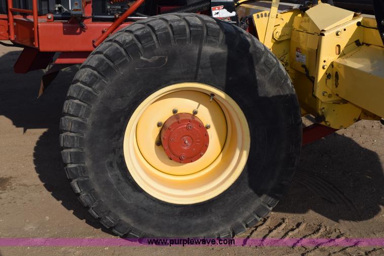 image for item K2432 2003 New Holland HW320 self-propelled windrower