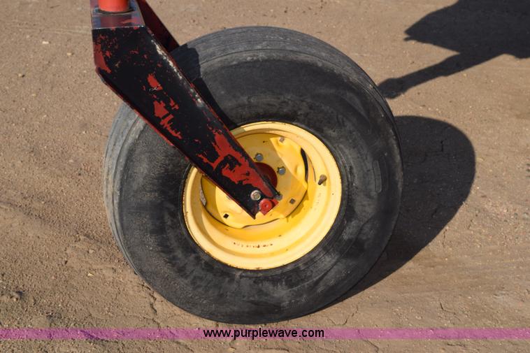 image for item K2432 2003 New Holland HW320 self-propelled windrower