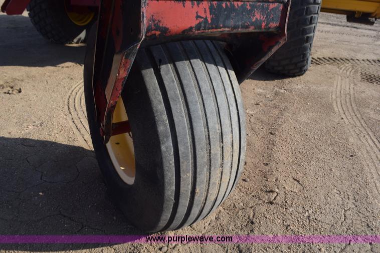 image for item K2432 2003 New Holland HW320 self-propelled windrower