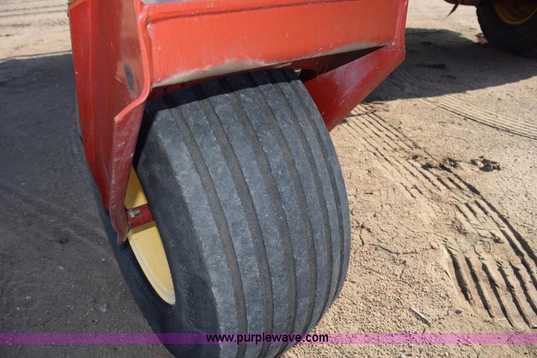 image for item K2432 2003 New Holland HW320 self-propelled windrower