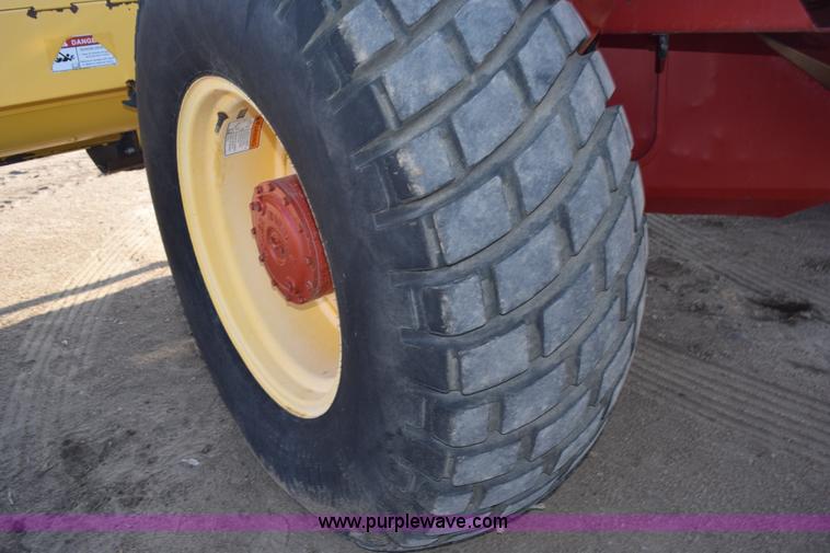 image for item K2432 2003 New Holland HW320 self-propelled windrower