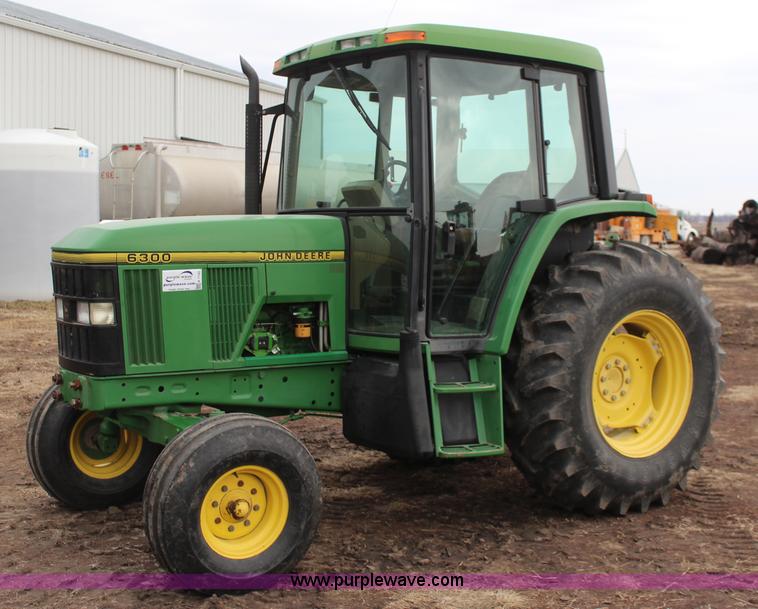 image for item K7142 1996 John Deere 6300 tractor
