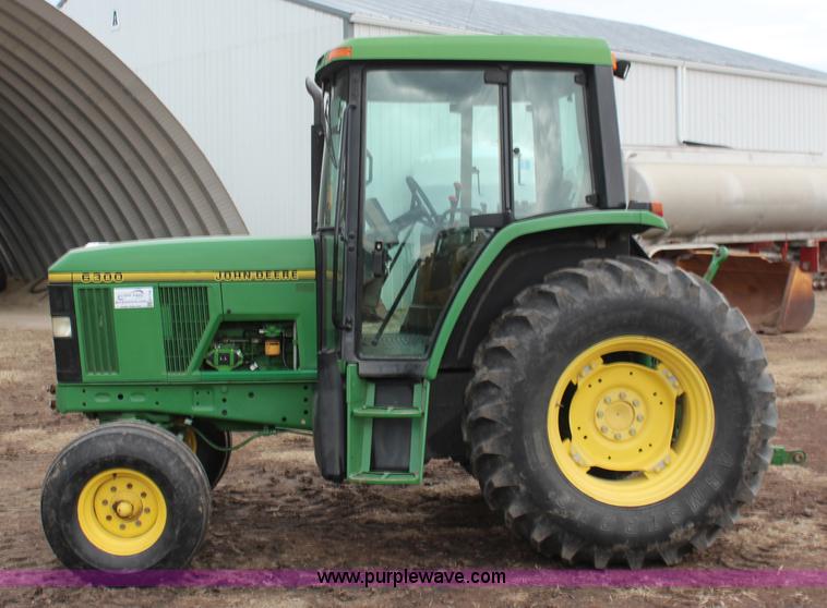 image for item K7142 1996 John Deere 6300 tractor