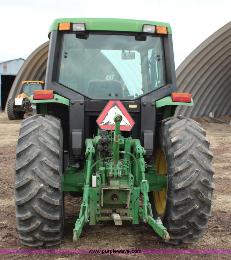 image for item K7142 1996 John Deere 6300 tractor