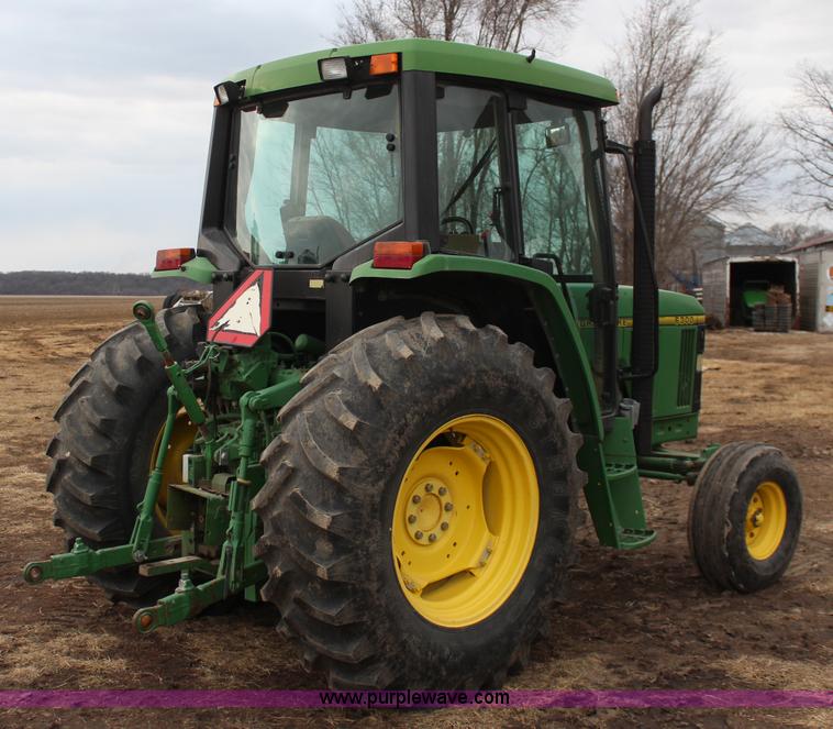 image for item K7142 1996 John Deere 6300 tractor