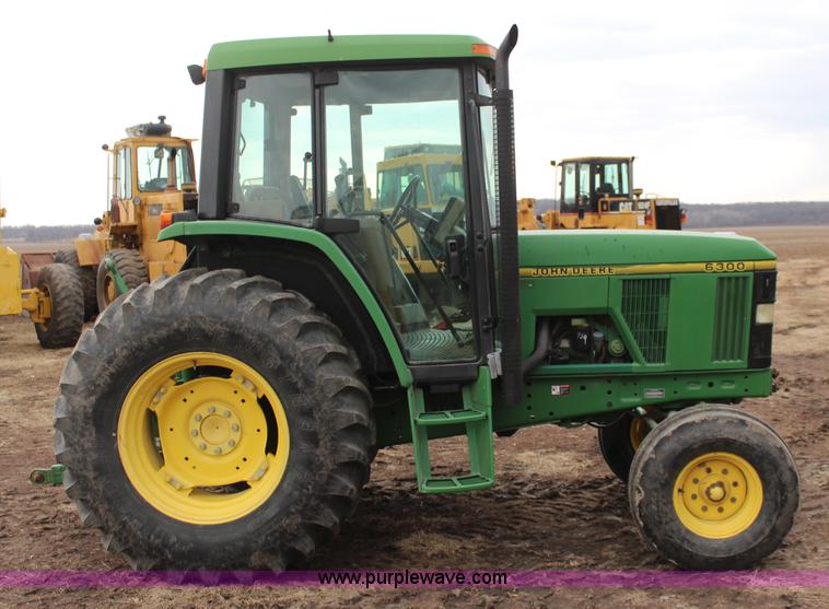 image for item K7142 1996 John Deere 6300 tractor