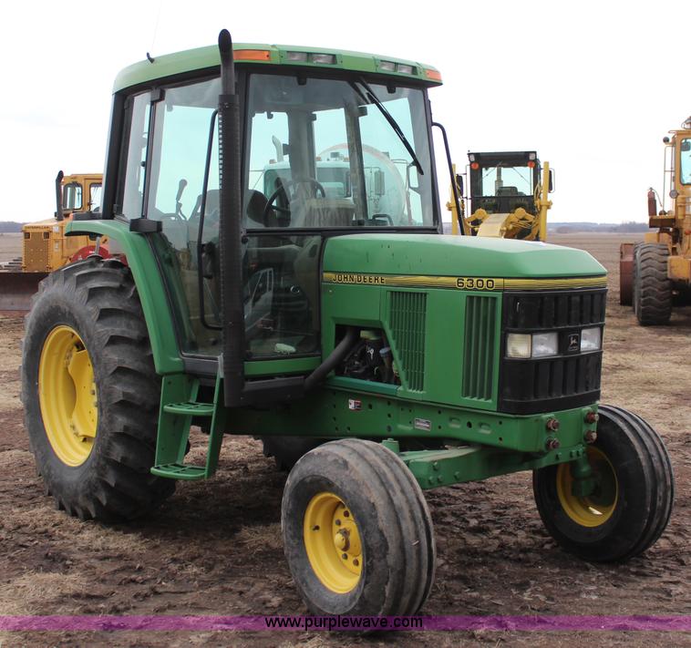 image for item K7142 1996 John Deere 6300 tractor