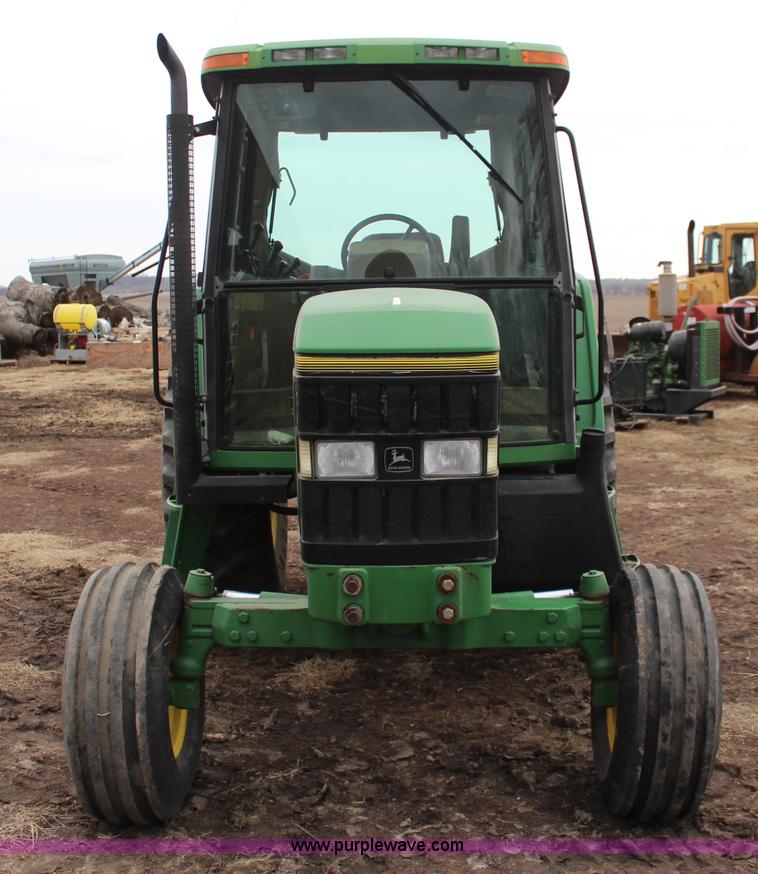 image for item K7142 1996 John Deere 6300 tractor