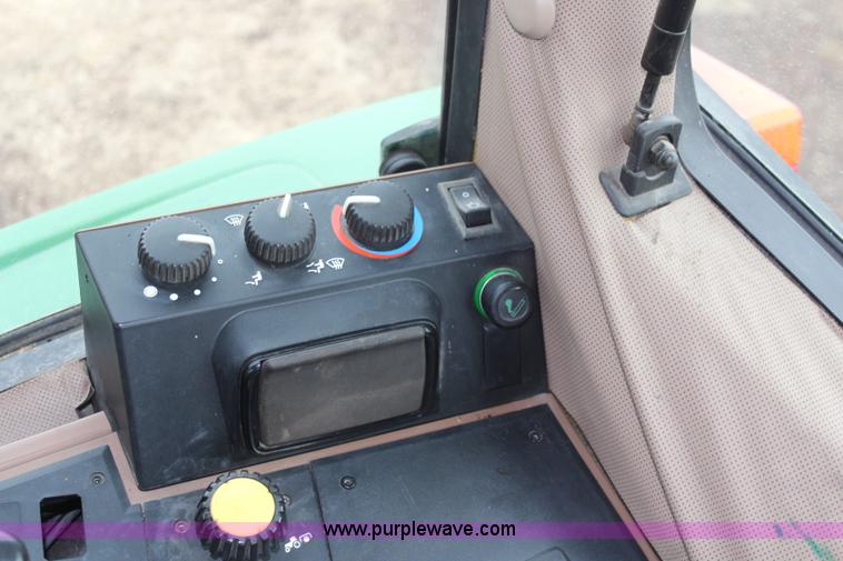 image for item K7142 1996 John Deere 6300 tractor