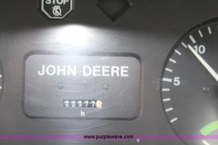 image for item K7142 1996 John Deere 6300 tractor