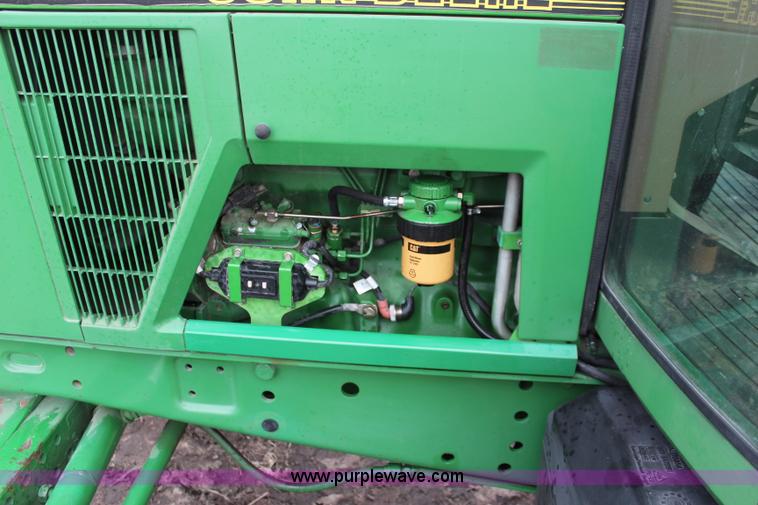 image for item K7142 1996 John Deere 6300 tractor