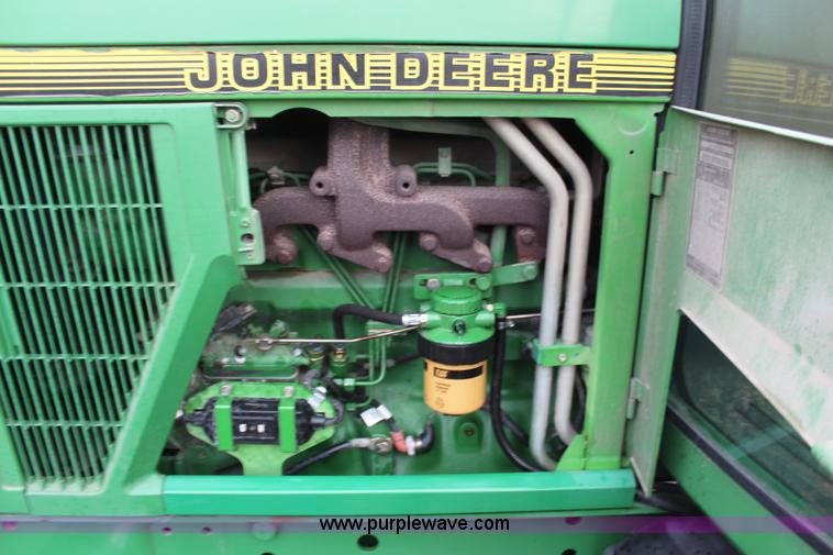 image for item K7142 1996 John Deere 6300 tractor
