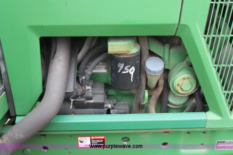 image for item K7142 1996 John Deere 6300 tractor