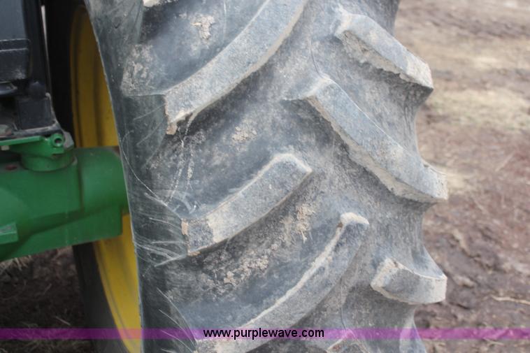 image for item K7142 1996 John Deere 6300 tractor