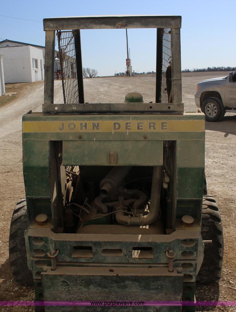 image for item L6735 John Deere 170 skid steer