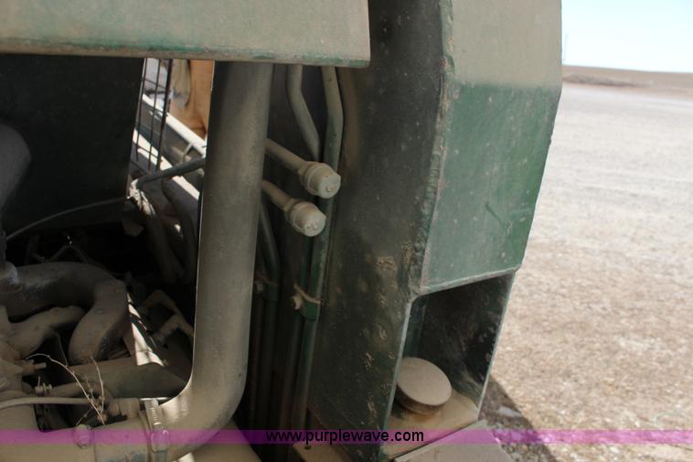 image for item L6735 John Deere 170 skid steer