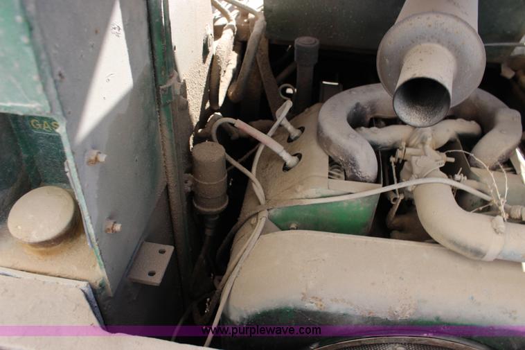 image for item L6735 John Deere 170 skid steer