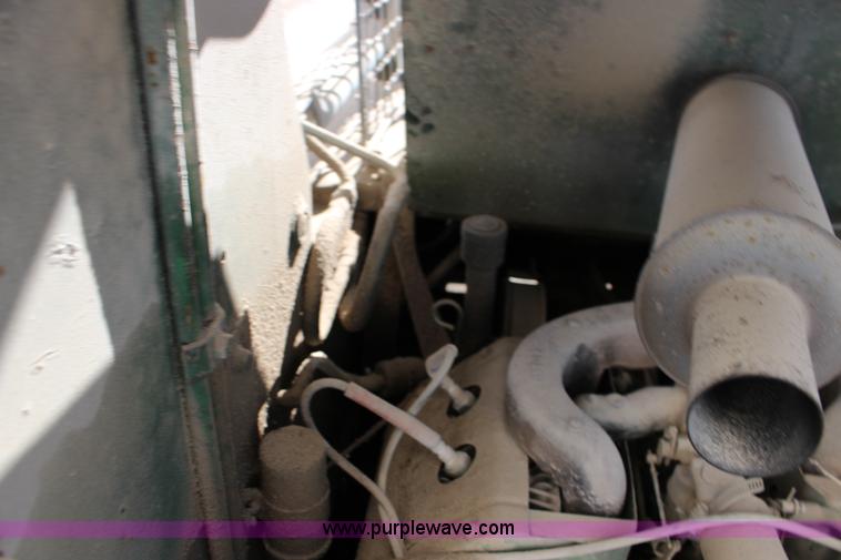 image for item L6735 John Deere 170 skid steer