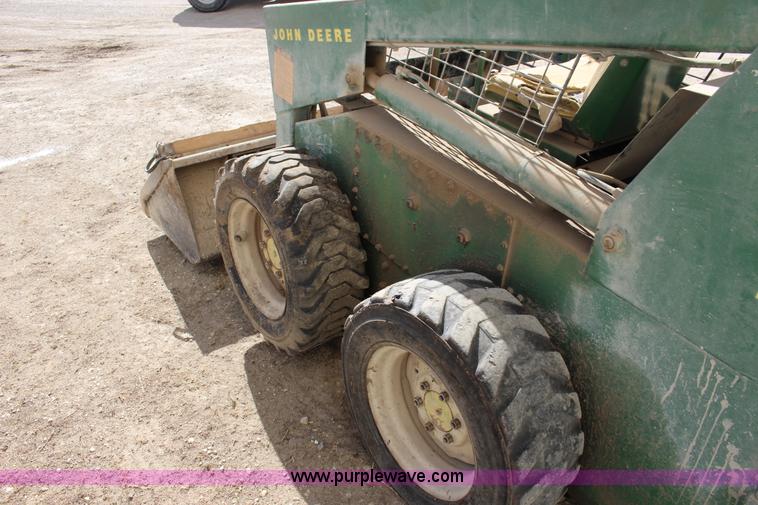 image for item L6735 John Deere 170 skid steer