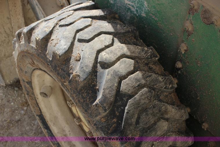 image for item L6735 John Deere 170 skid steer