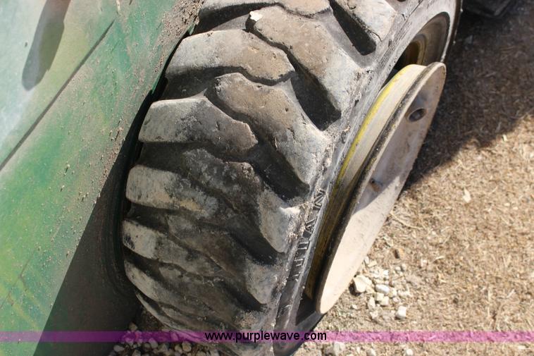 image for item L6735 John Deere 170 skid steer