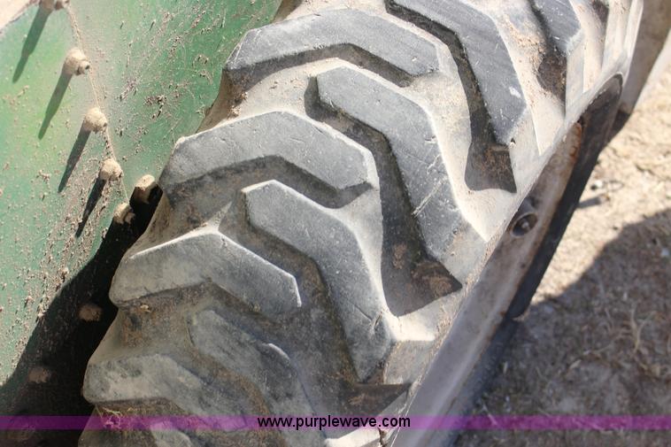 image for item L6735 John Deere 170 skid steer