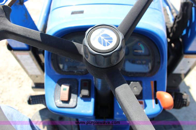 image for item L6737 2005 New Holland TC33DA MFWD compact utility tractor