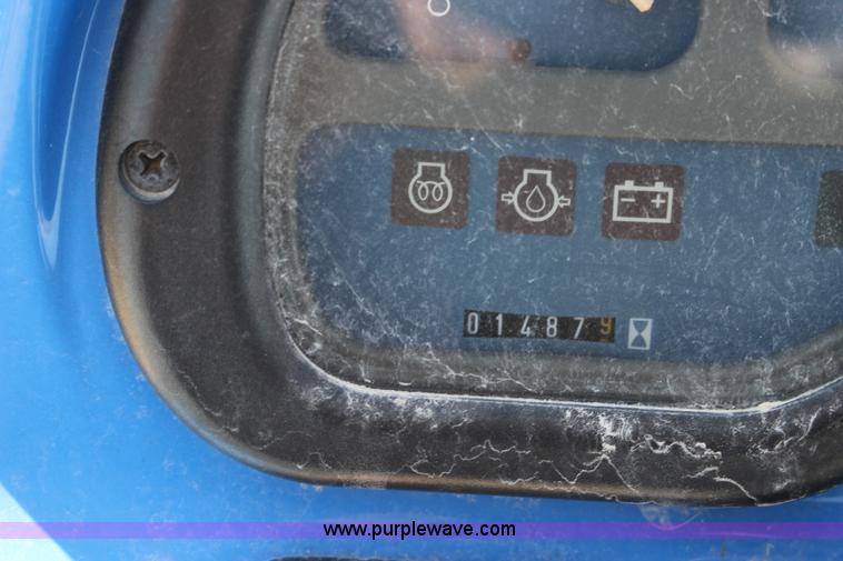 image for item L6737 2005 New Holland TC33DA MFWD compact utility tractor