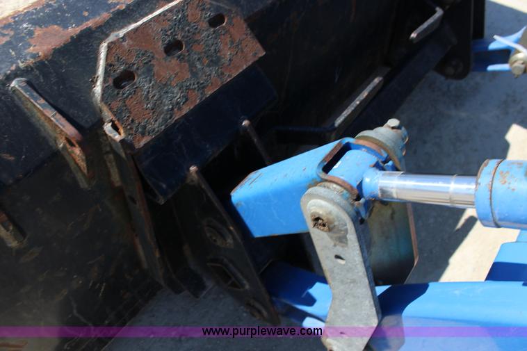 image for item L6737 2005 New Holland TC33DA MFWD compact utility tractor