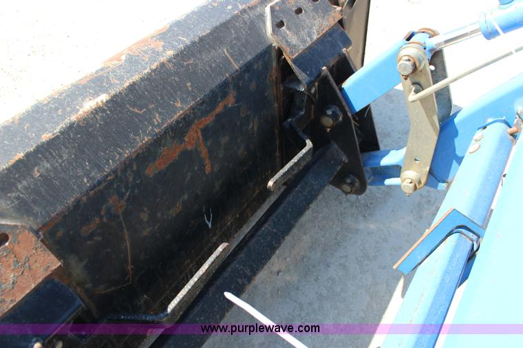 image for item L6737 2005 New Holland TC33DA MFWD compact utility tractor