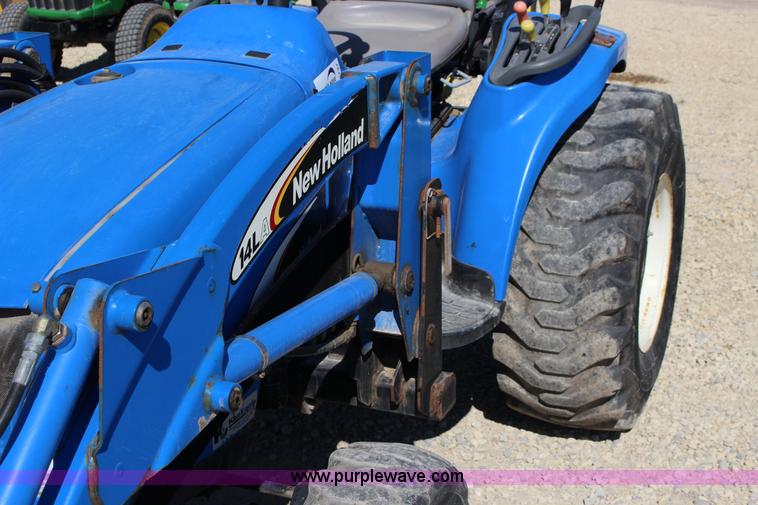 image for item L6737 2005 New Holland TC33DA MFWD compact utility tractor