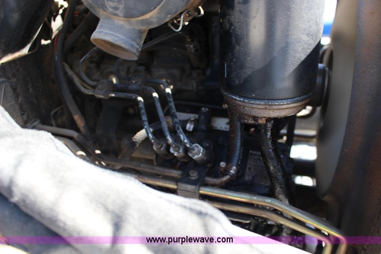 image for item L6737 2005 New Holland TC33DA MFWD compact utility tractor