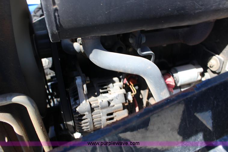 image for item L6737 2005 New Holland TC33DA MFWD compact utility tractor