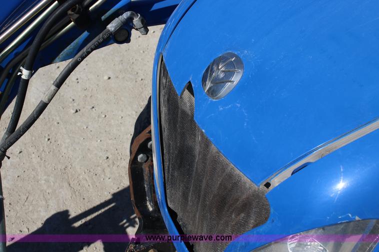 image for item L6737 2005 New Holland TC33DA MFWD compact utility tractor