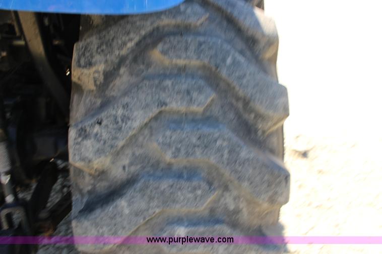 image for item L6737 2005 New Holland TC33DA MFWD compact utility tractor
