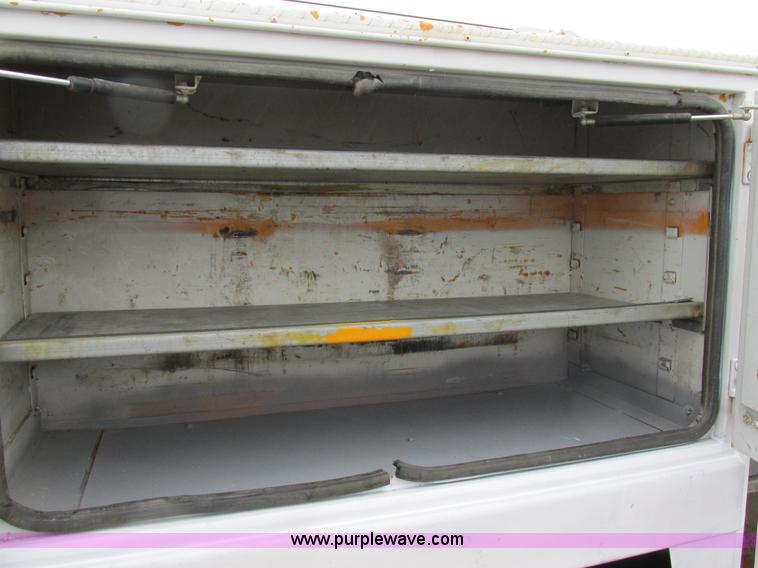 image for item AW9769 1997 International 4700 service truck